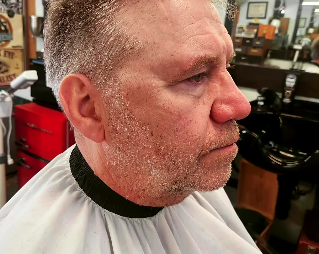 A classic scissor cut, side profile